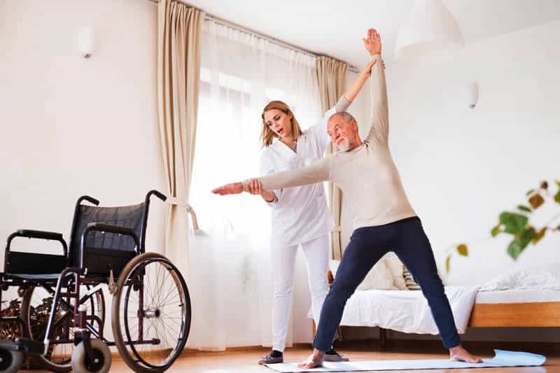 nurse and exercising senior